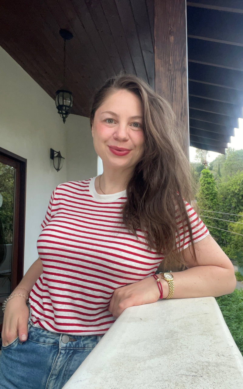 Elena Dragoi, floral artist and curator, welcoming visitors to her journal on beauty and wellness